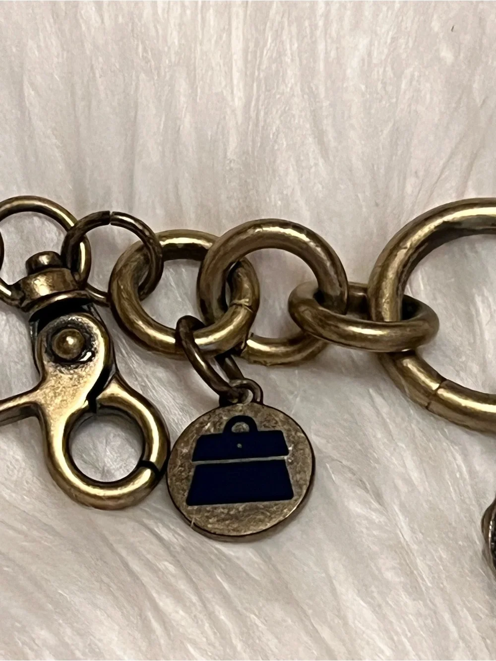 Kathy Van Zeeland Y2K Brass Tone Charm Keychain with Clear Heart
